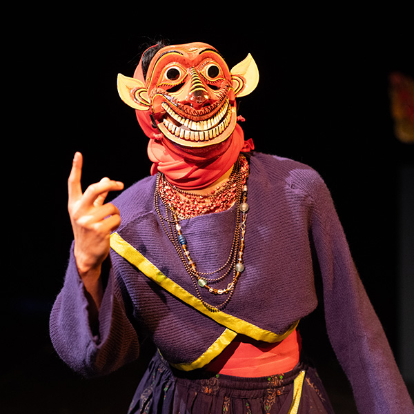 Man in a red mask with a large smile