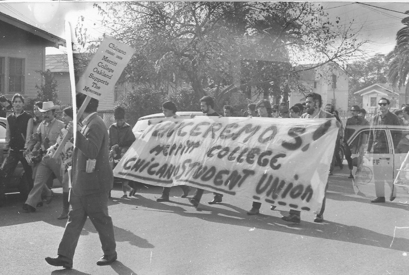 Protest Against Vietnam War - College students and other people marching "VENCEREMOS! MERRIT COLLEGE CHICANO STUDENT UNION" Chicano Student Union Merrit College Oakland Supports The Moratorium"