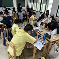 Students working on Self-Portrait Art Lesson in Mandarin
