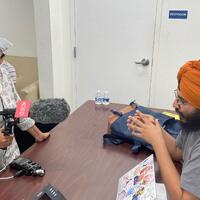 Srishti Prabha interviews someone for KQED 