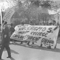 Protest Against Vietnam War - College students and other people marching "VENCEREMOS! MERRIT COLLEGE CHICANO STUDENT UNION" Chicano Student Union Merrit College Oakland Supports The Moratorium"