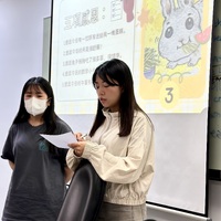 Volunteer Graduate Students Presenting Lesson Plan